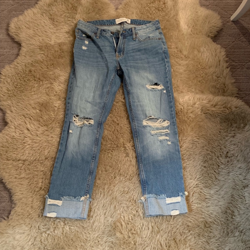 Distressed medium washed jeans